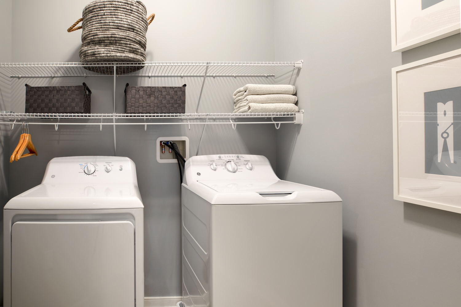 Laundry room with full size washer and dryer