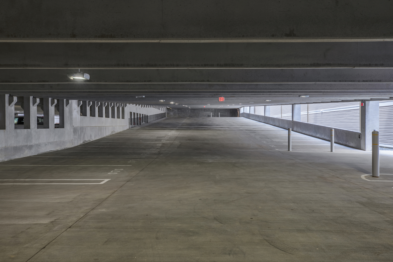 Parking garage with assigned spaces