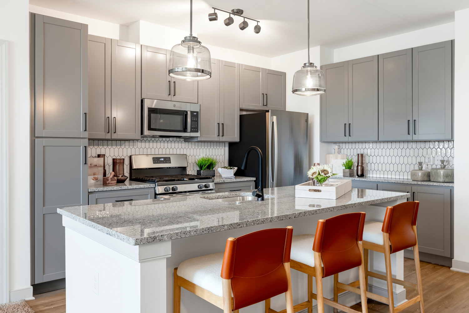 Kitchen with island and bar seating