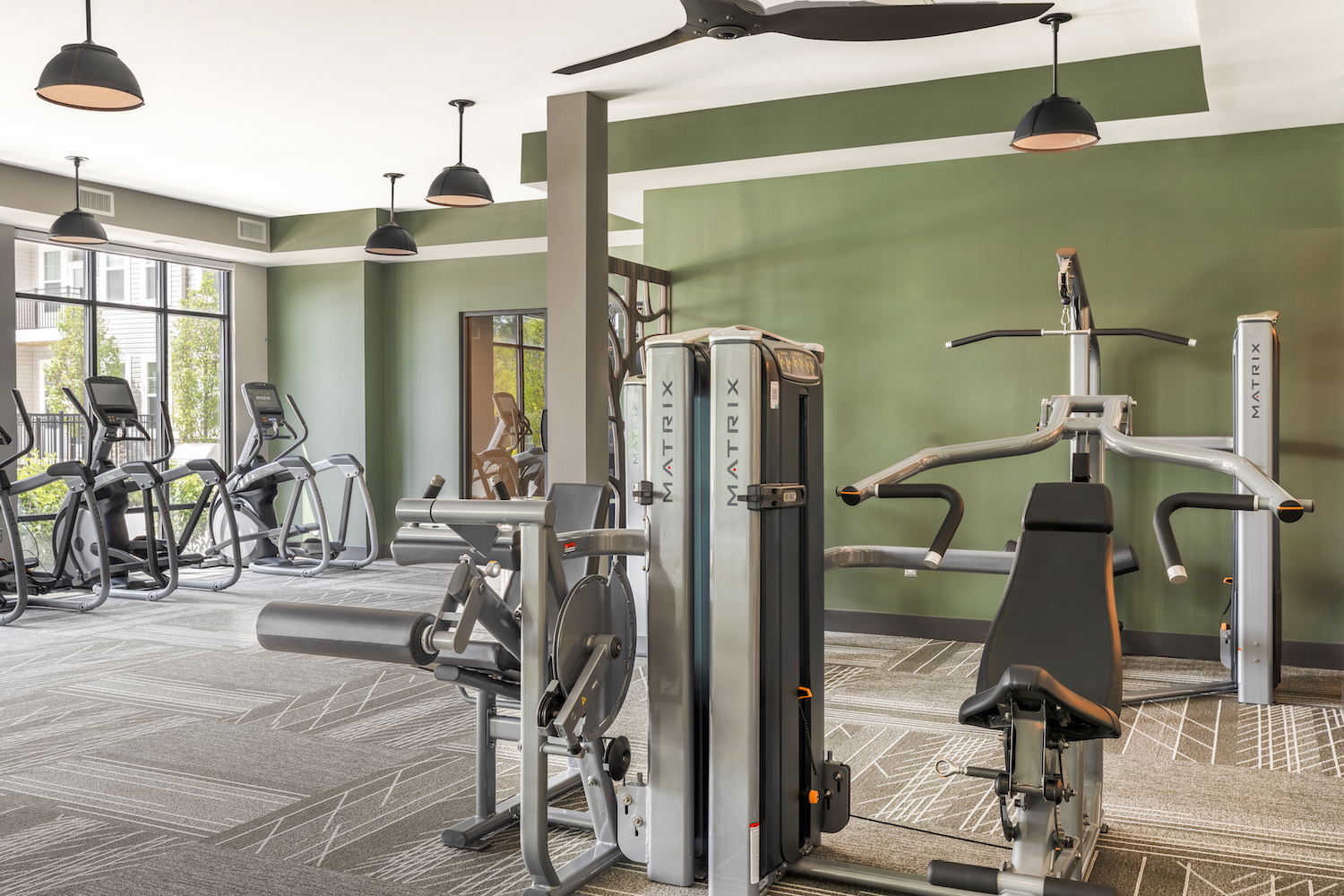 Refinery fitness center with weight and cardio machines