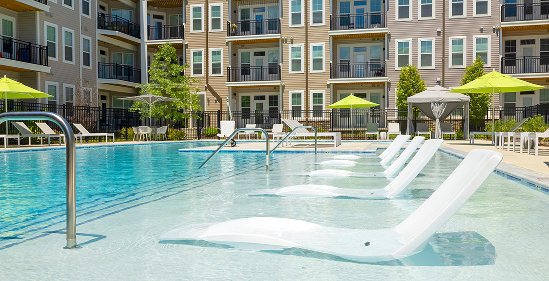 Refinery outdoor pool with seating