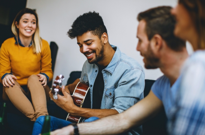 Friends playing guitar