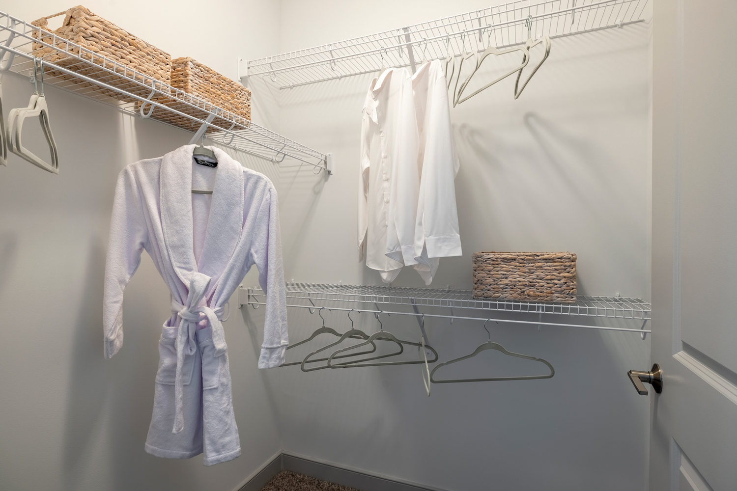 Closet with robe and shoe boxes